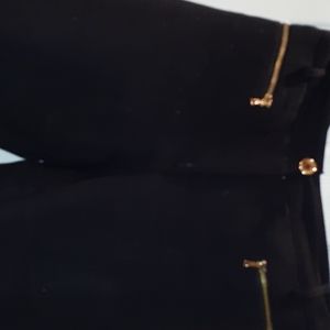 Pants black with gold zip packets